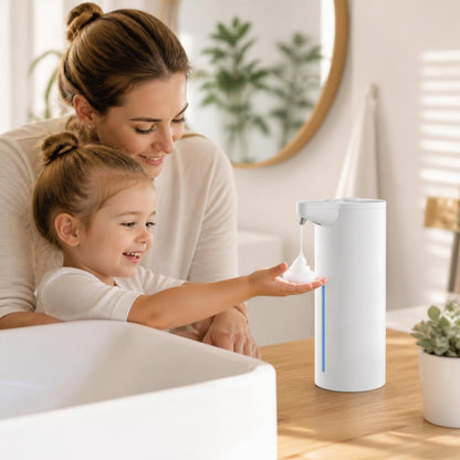 Parent and child using the touchless soap dispenser